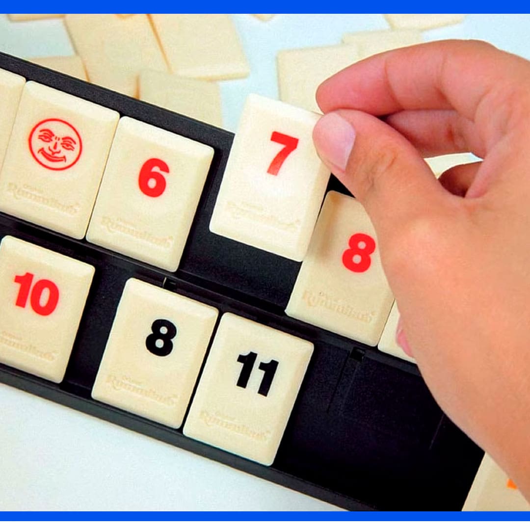 Jogo Rummikub Grow jogada mão peças pedras números vermelho preto
