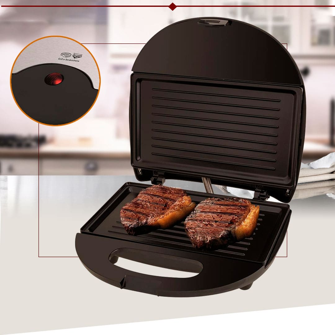 Mini Grill aparelho equipamento aberto dois pedaços carne destaque luz vermelha acesa fundo cozinha