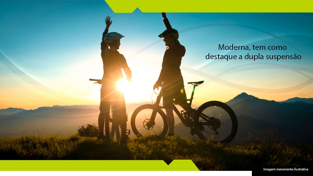 imagem mostra dois ciclistas em uma montanha
